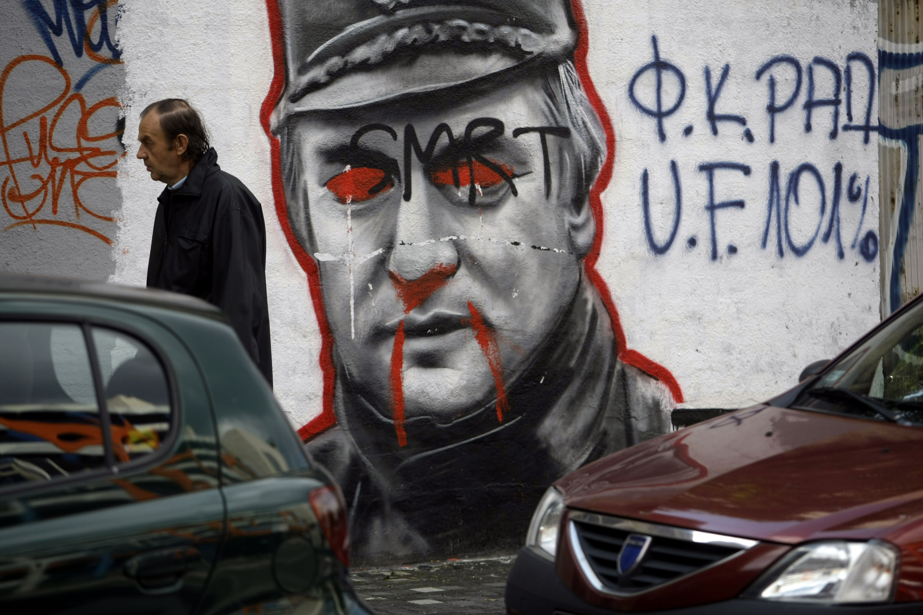 Konflikten var en följd av upplösningen av Jugoslavien, där båda parter slogs för självständighet. Mladic på en väggmålning i Belgrad.