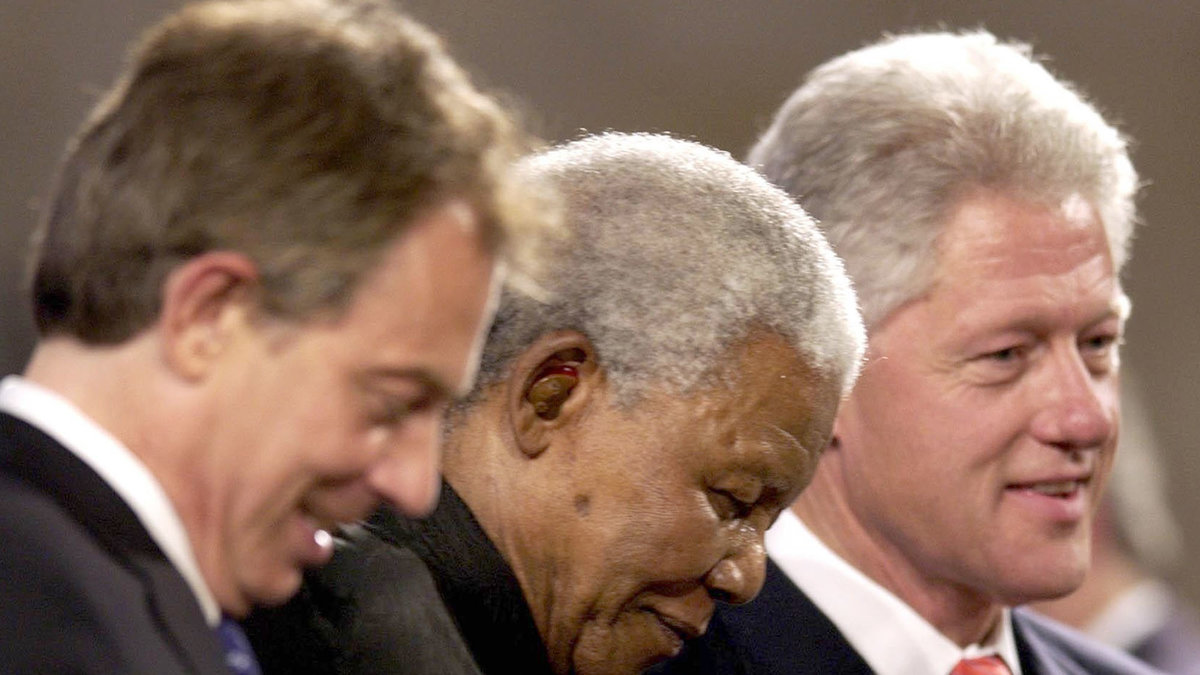 Tillsammans med Tony Blair och Bill Clinton 2003.