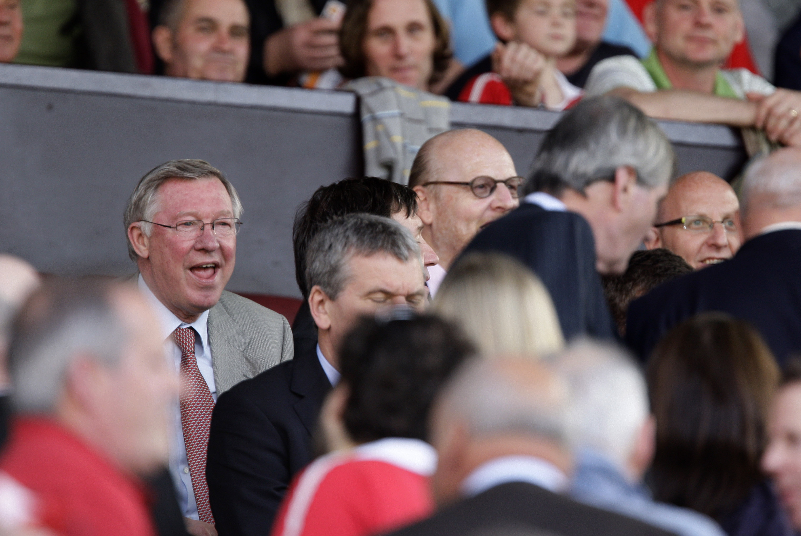 Alex Ferguson tillsammans med Manchester Uniteds ägare.