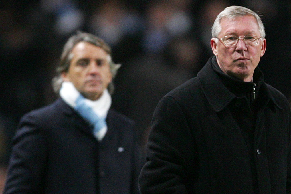 Manchester Uniteds Alex Ferguson och Citys Roberto Mancini drabbar samman under lördagen.
