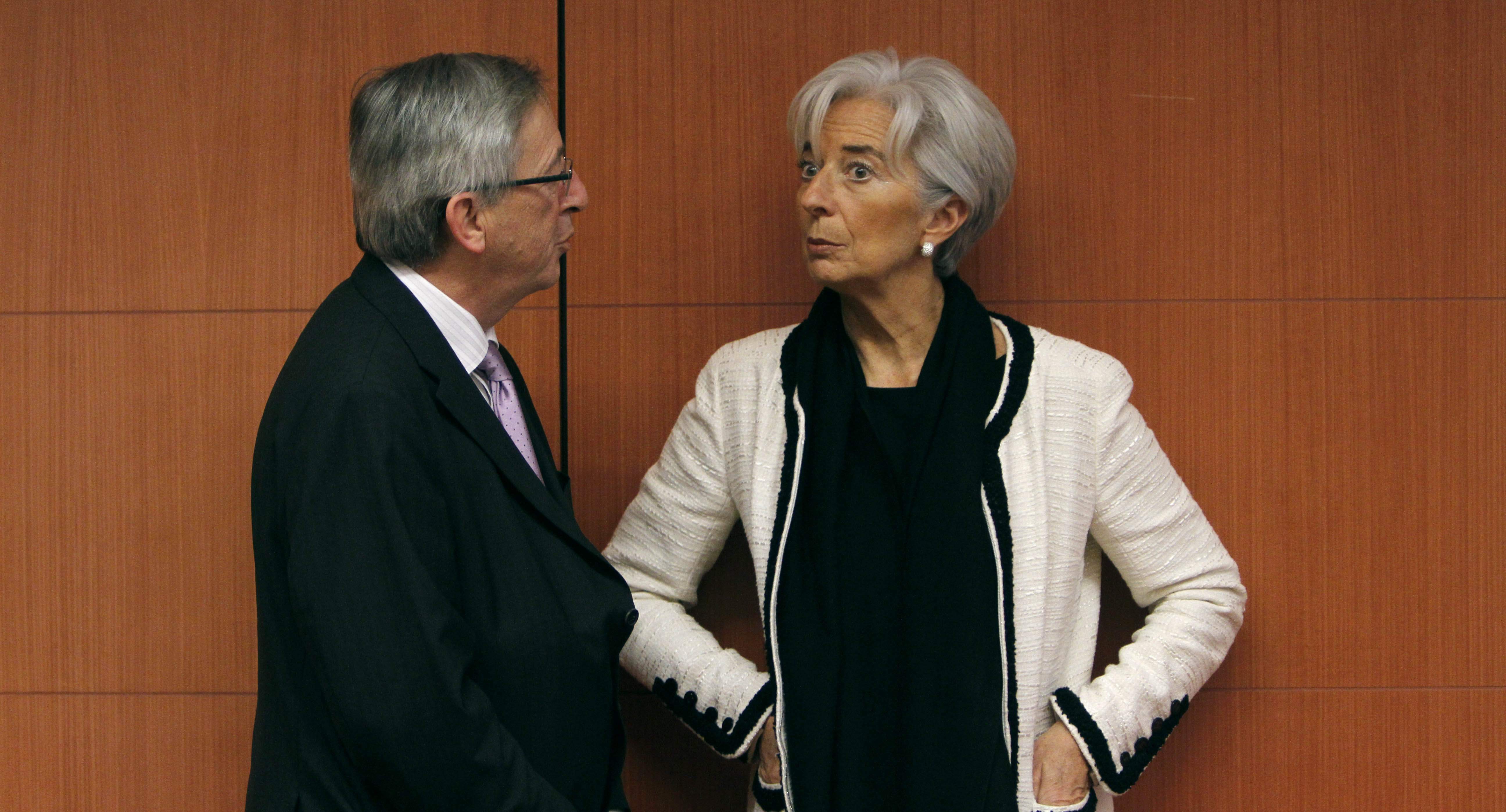 Jucker tillsammans med Christine Lagarde, Frankrikes finansminister.