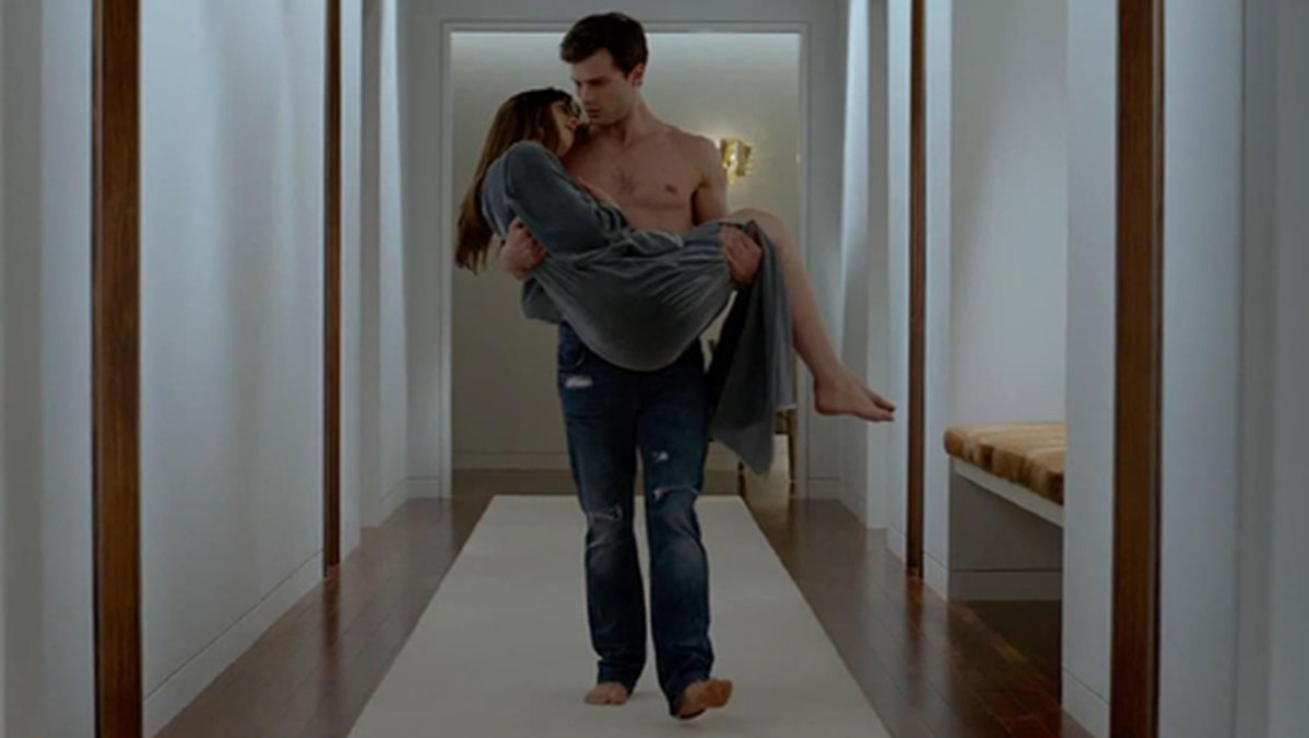 Dakota Johnson som Anastasia Steele och Jamie Dornan som Christian Grey i filmatiseringen av "Fifty shades of Grey".