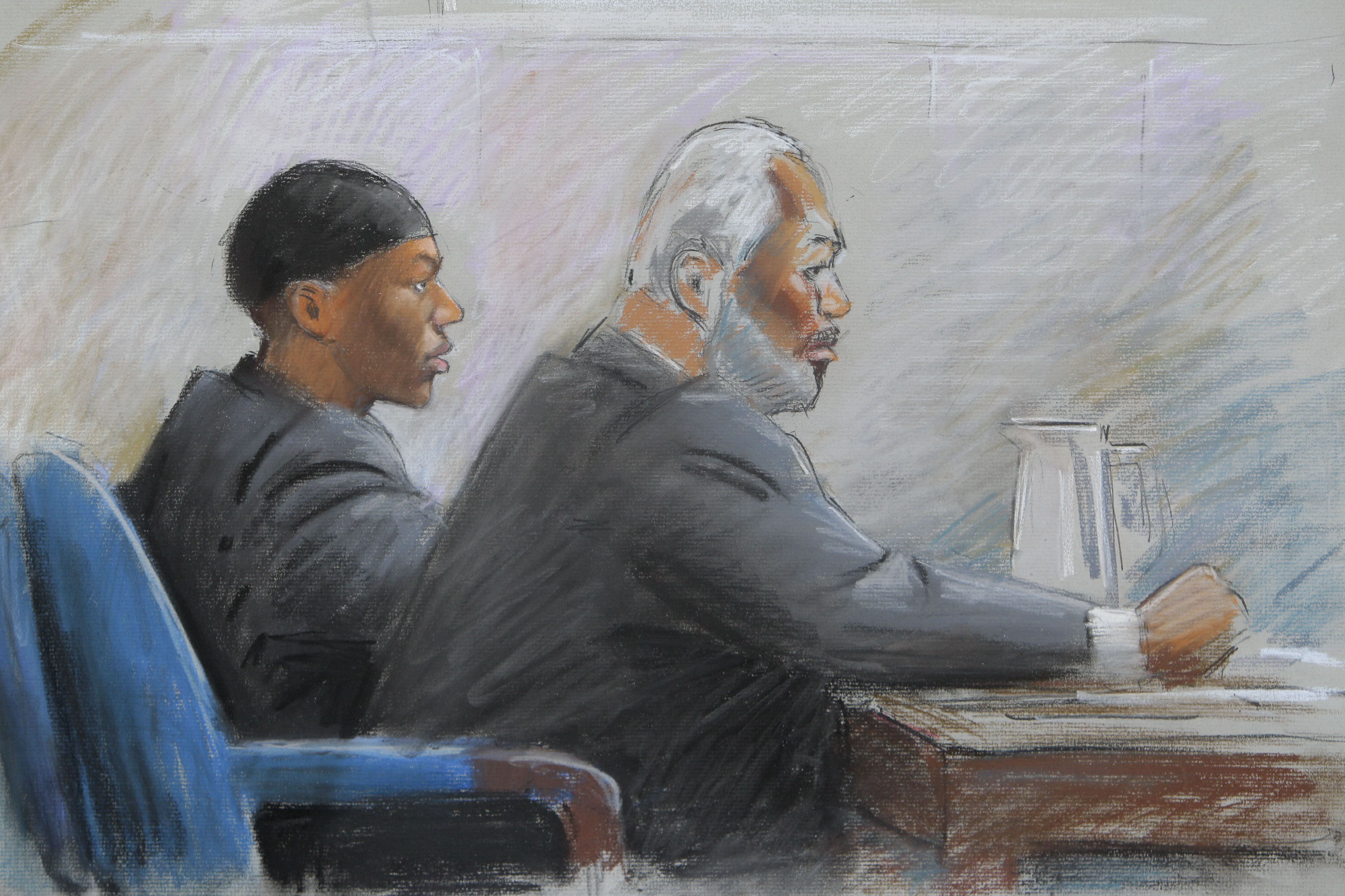 Abdulmutallab till vänster i bild, tillsammans med sin assisterande försvarasadvokat, Anthony Chambers i rättssalen.
