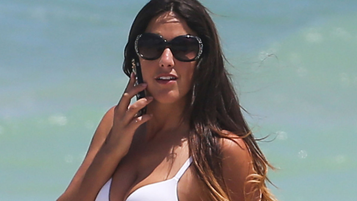 Modellen Claudia Romani firar den 4:e juli på Miami Beach.
