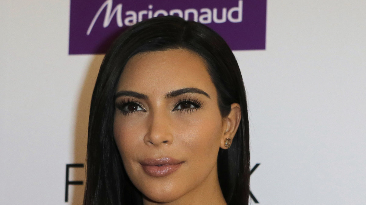 Kim Kardashian blev väckt av en berusad kvinna. 