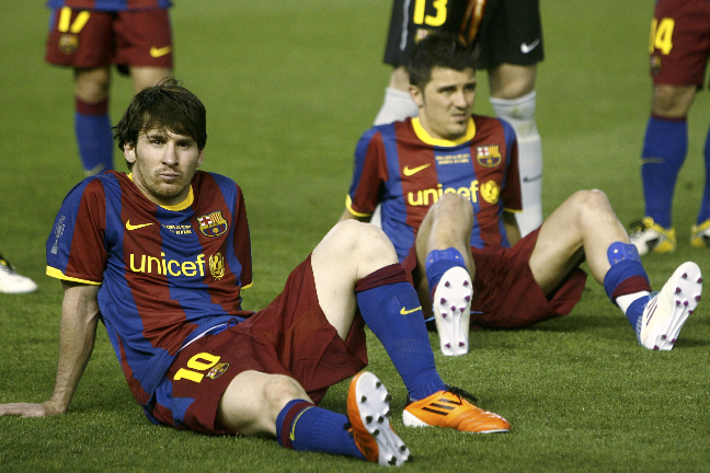 Messi och Villa deppar efter förlusten i Copa del Rey mot ärkerivalen Real Madrid. Messi och Villa deppar efter förlusten i Copa del Rey mot ärkerivalen Real Madrid.