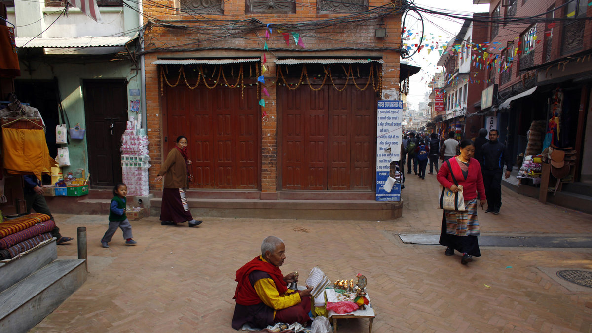 Besök ett torg i Katmandu.