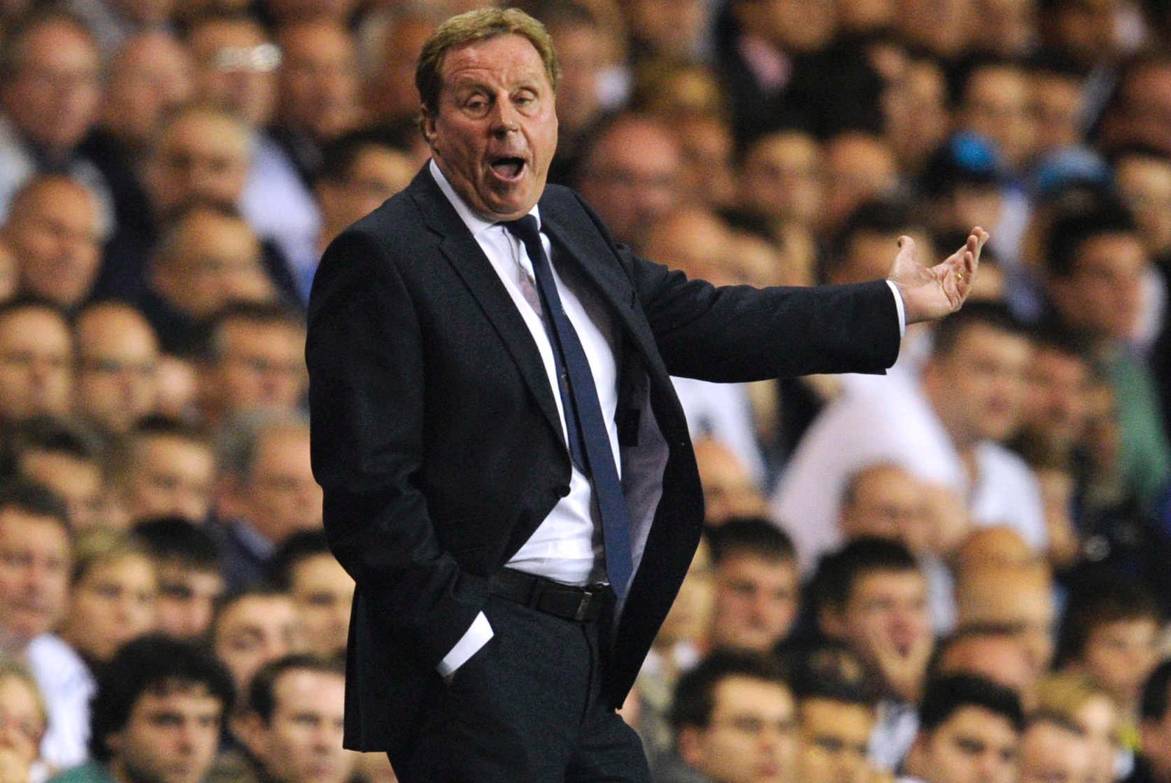 Tottenham-managern Harry Redknapp tror att tåget har gått för rivalerna Arsenal.