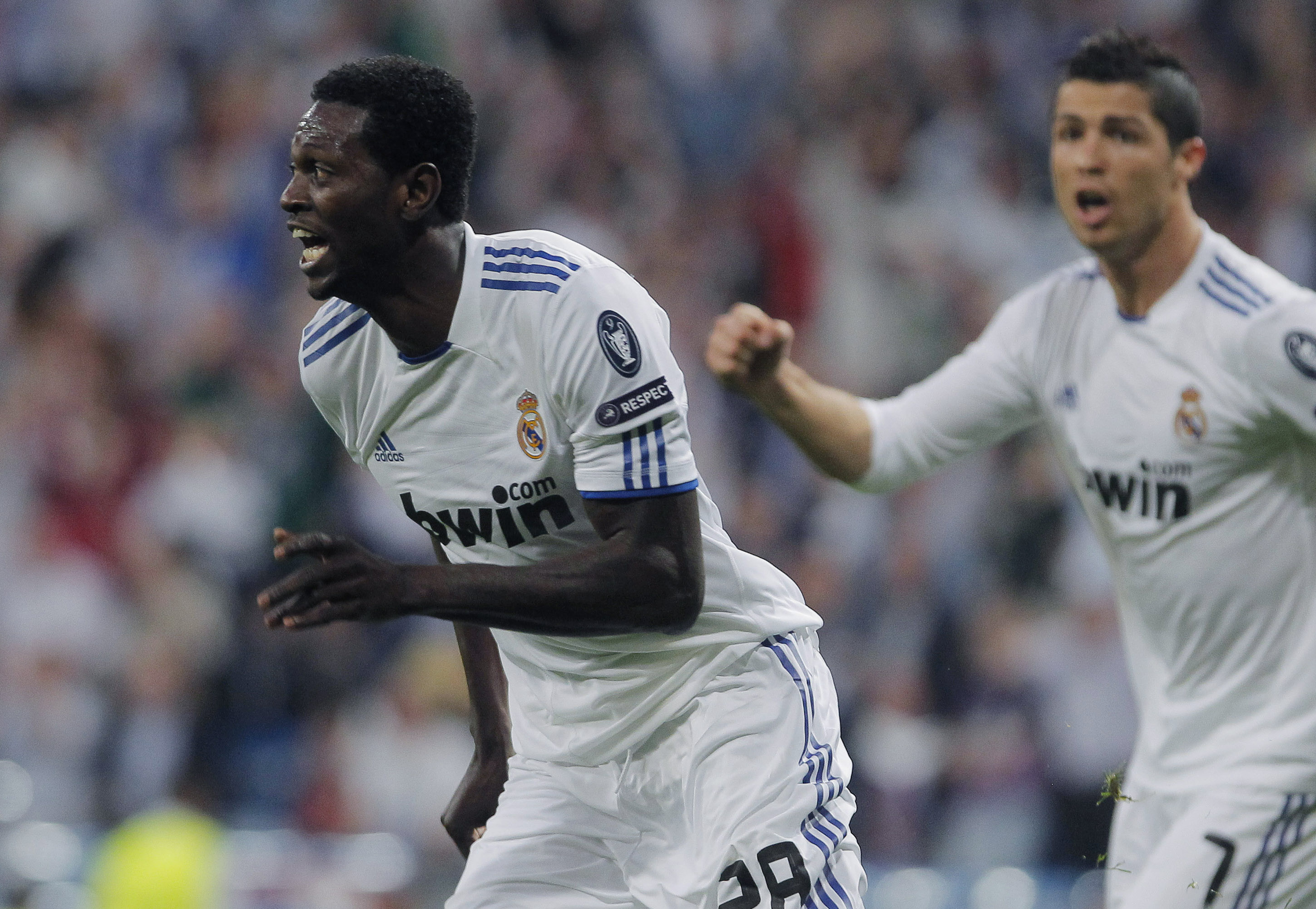 Adebayor gjorde två mål, men tror inte att rasismen går att stoppa.