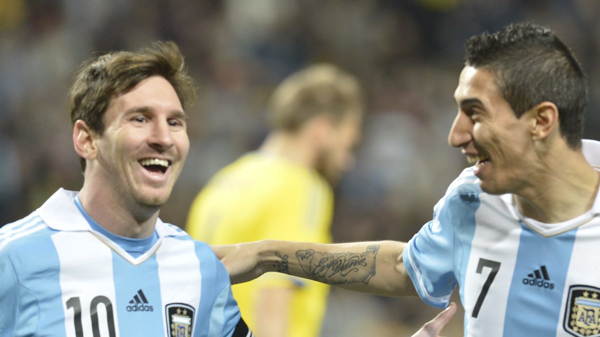 Gladare miner hos Lionel Messi och Angel Di Maria.