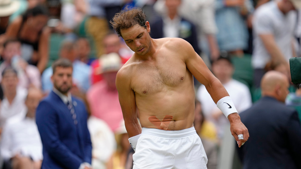 Rafael Nadal spelade Wimbledon-kvartsfinal med en magskada.