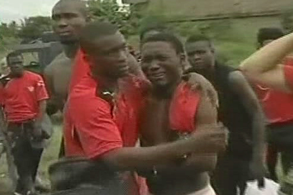 Chockade Togo-spelare efter attacken.