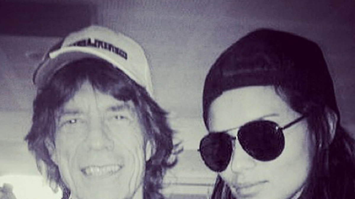 Adriana Lima hänger med Mick Jagger.