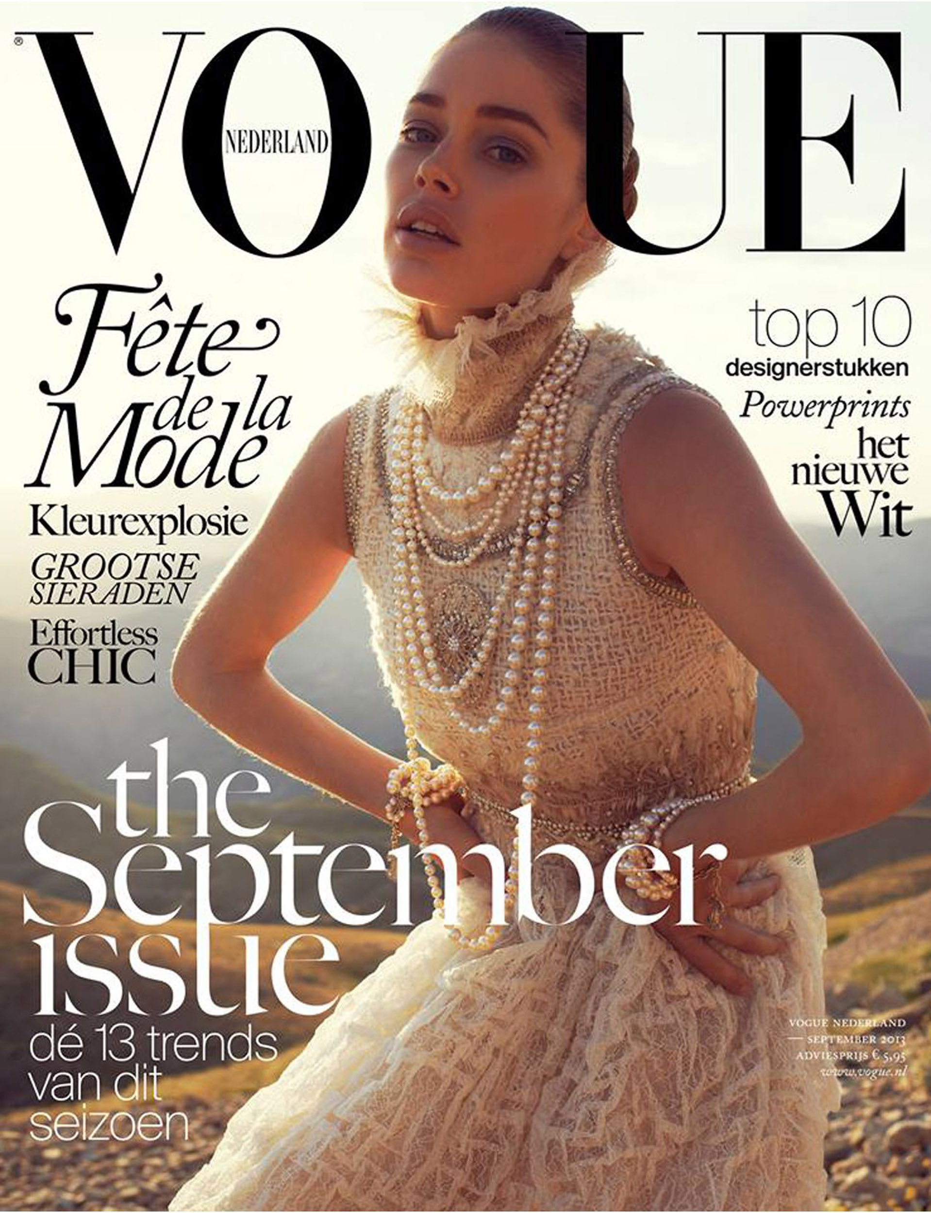 Doutzen Kroes i klädd i pärlor på omslaget av "Vouge". 