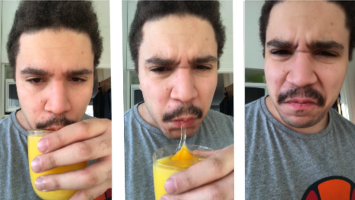 Man dricker apelsinjuice med rått ägg i. 
