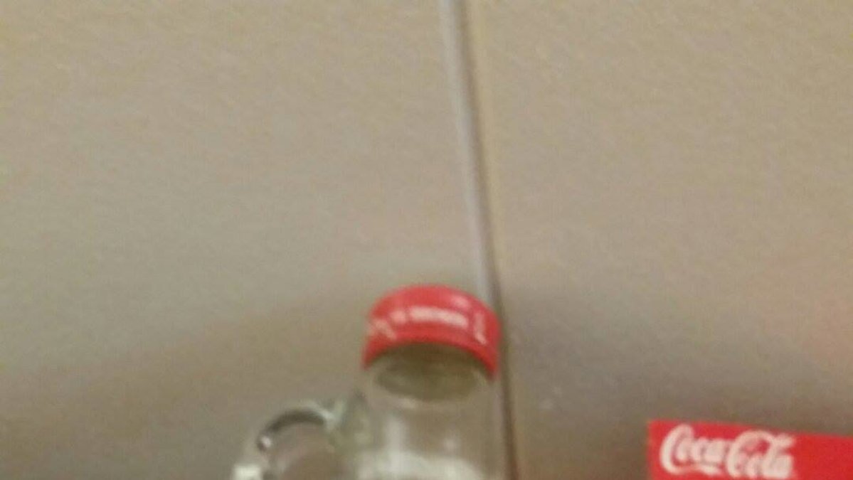 Den här flaskan är Coca Cola koncentrerat. 
